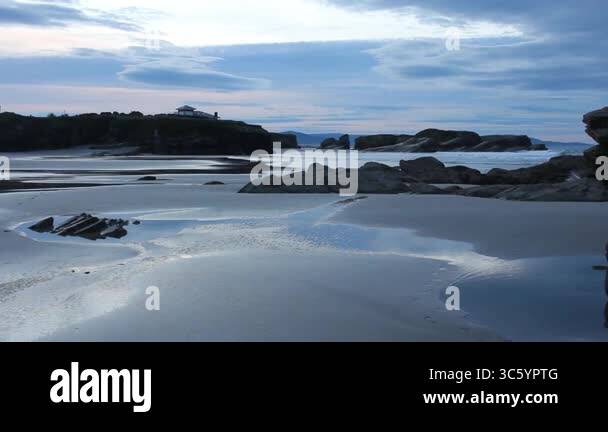 the tranquility of sunset in Os Castros beach Stock Video Footage - Alamy