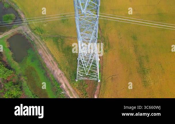 Power Through Line High-voltage power lines pass through agricultural areas in rural areas ...