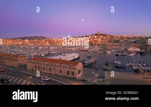 Slow panning of the Marseille city skyline at night, France. Beautiful ...
