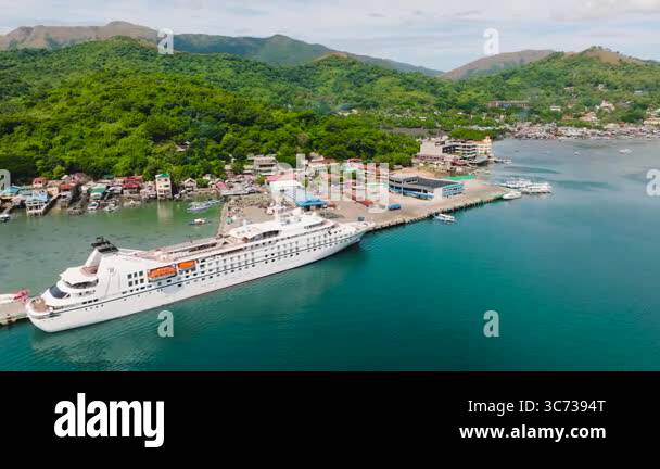 Cruise Ship in Coron Port, coastline area Stock Video Footage - Alamy