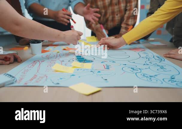 A vibrant scene depicting a collaborative brainstorming session ...