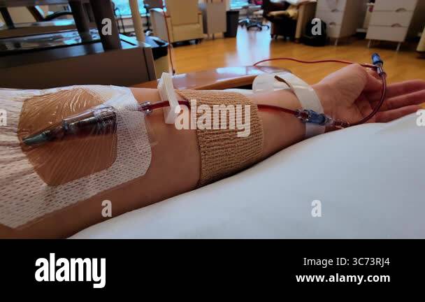 The medical treatment is in progress. Female patient hand in a ...