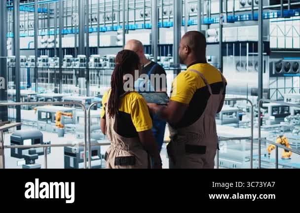 Industry 4.0 industrial plant engineering team designs new robotic ...