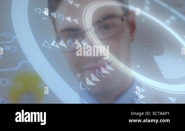 Smiling man with glasses interacting with animation on futuristic ...