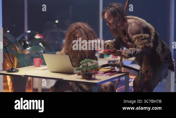 Primeval IT engineer using laptop computer discovering technology at ...
