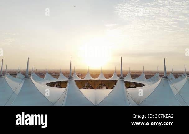 An aerial view of the sunrise of the Riyadh Stadium. A serene aerial ...