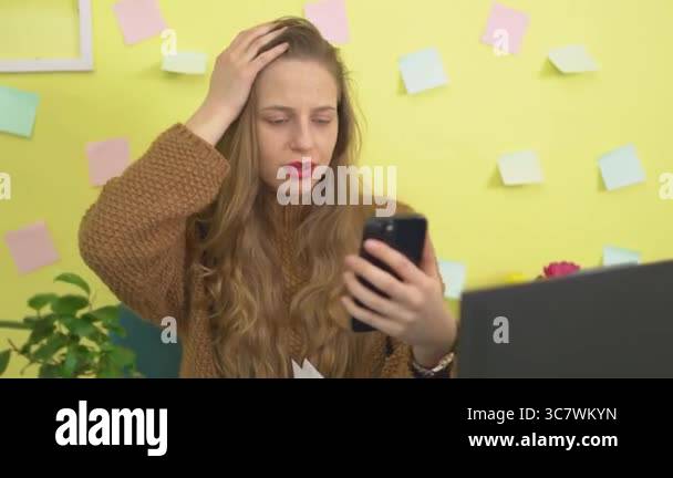 Curated visual reference: Gallery Detail: Frustrated Woman Checking Her Phone And Shaking Her Head In