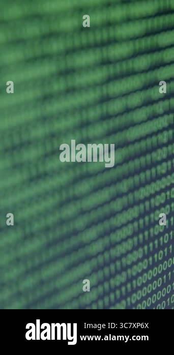 Bits and bytes. Screen with binary code down, illuminated in green. Big ...