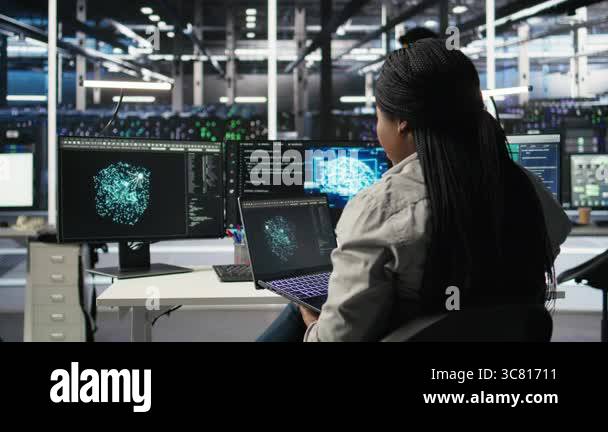 Data center admin uses AI technology on laptop for machine learning ...