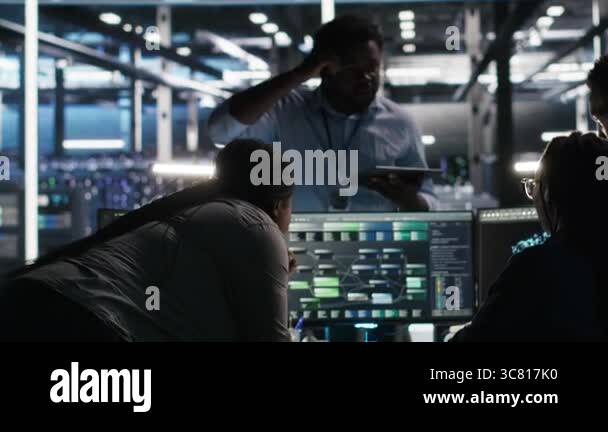 Data center teamworking programmers using node tree tool to identify ...