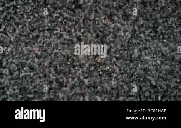 Film Screen Interference Close-up footage shows television screen noise with subtle vertical ...