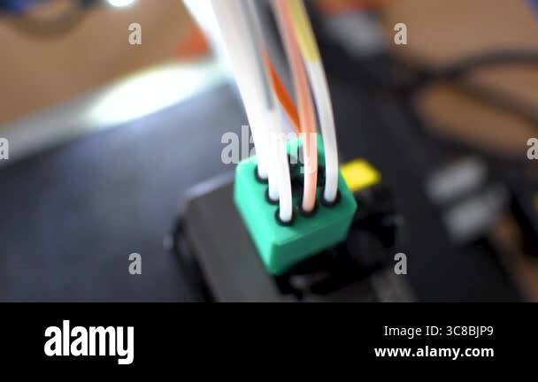 3d printer printing an object on the tray with pla filament, corn ...