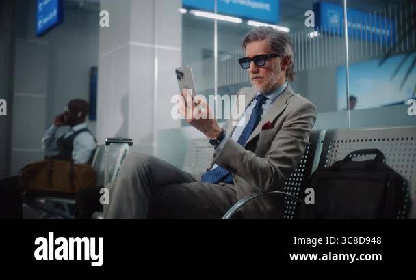 Airport Terminal: Successful Businessman Talking to Business Partner on ...