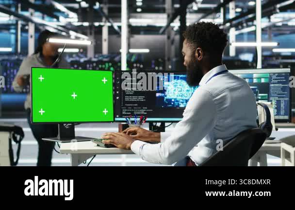 Data center admin using AI node tree software on isolated screen PC to ...