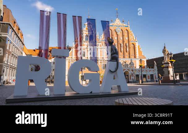 The iconic Riga sign with a cat figure on the letter A, set against the ...