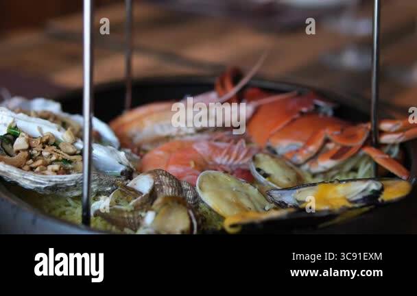two-tiered luxury platter of lobster and seafood crabs shrimp ...