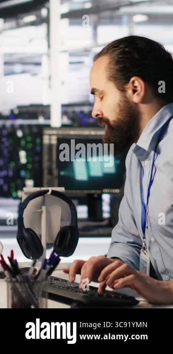 Vertical video Panicked engineers in data center react to ransomware ...