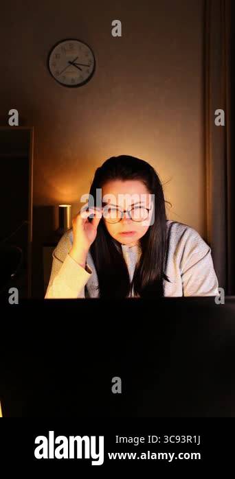 Woman sitting at desk and have video call with beloved people living ...