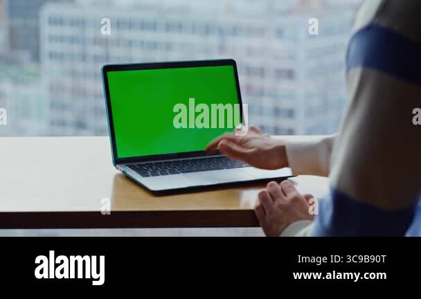Finger tapping chromakey computer touchpad working at corporate agency ...