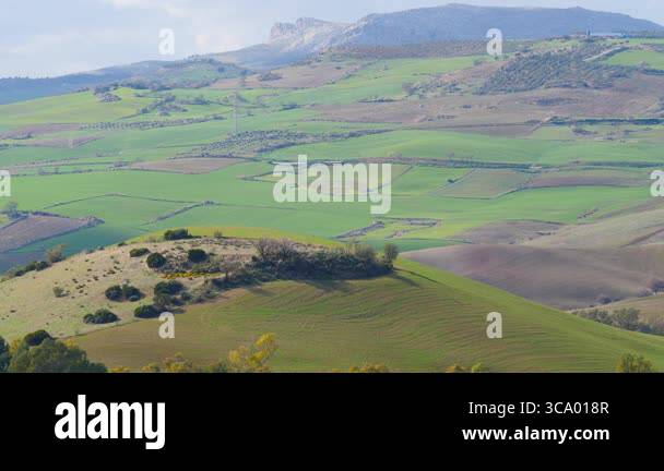 Spanish nature landscape. Green hills, countryside surrounding lake ...