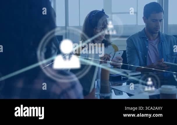 Group colleagues tapping devices at office table, generating animated ...