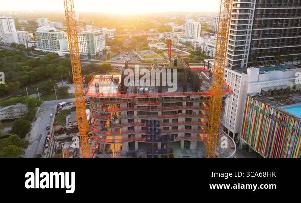 Skyscraper construction in Miami, Florida at sunset. USA real estate ...