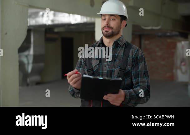 Angry furious man Caucasian guy builder stressed mad control building ...