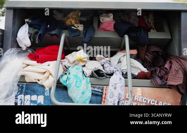Overflowing Rag Container Overflowing textile recycling container Stock Videos & Footage - HD and ...