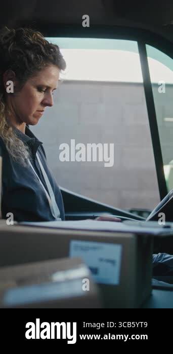 Female Product Supplier in Truck with Cardboard Boxes Using Tablet ...