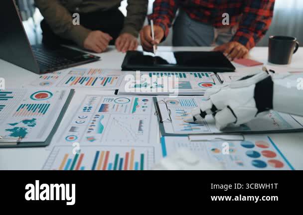 During a business meeting, a consultant and an assistant use an ...