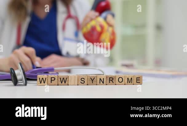 Wooden cubes spell WPW Syndrome on table creating rare disease theme in ...