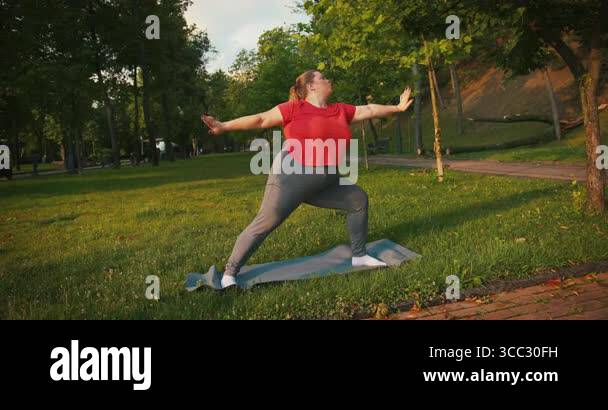 Outdoor Portrait of Body Positive Overweight Woman Doing Yoga Fitness ...