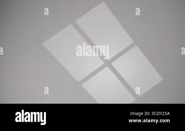 Abstract light reflections create a striking geometric pattern of four ...