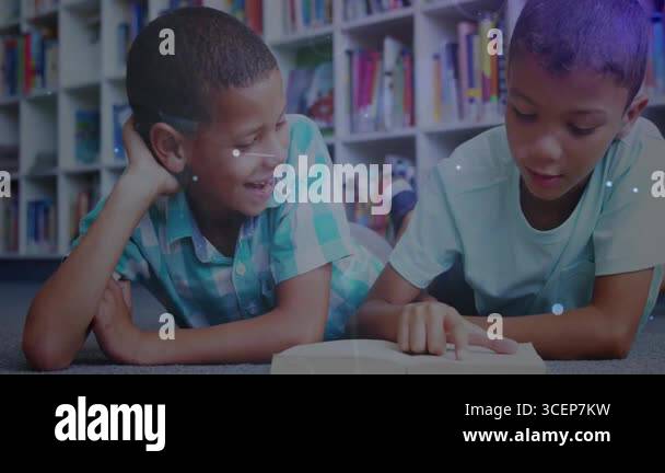 Two boys opening book and starting text tracking for practice under ...