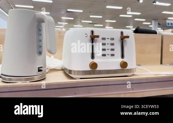 Toaster and kettle showcased on store counter Stock Video Footage - Alamy