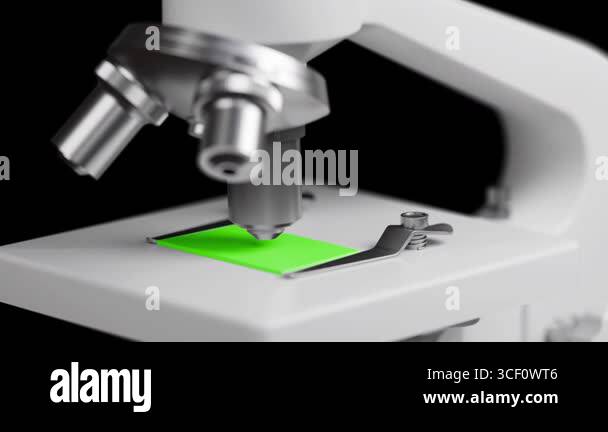 Microscope and green screen glass. Close up of a optical scientific ...