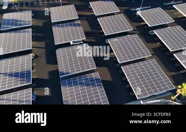 Dynamic aerial shot showing angled perspective of solar panel ...