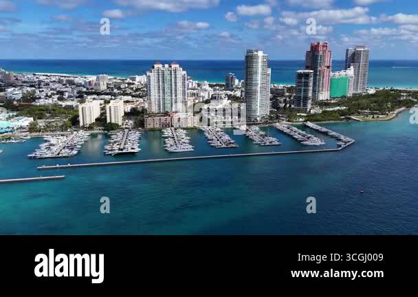 Aerial drone view of Miami marina with yachts and boats, surrounded by ...