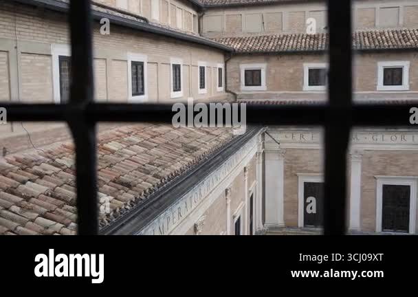 a renaissance palace facade landscape from an ancient window. High ...