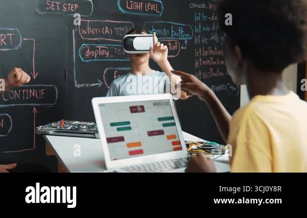 African boy programming system while caucasian girl enter metaverse ...
