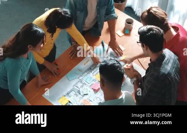 Teamwork Smart Ass Top view of smart business team work together and holding wrist ...