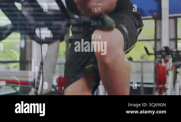 man pedaling bike starting workout, showing heart-rate percentage graph ...