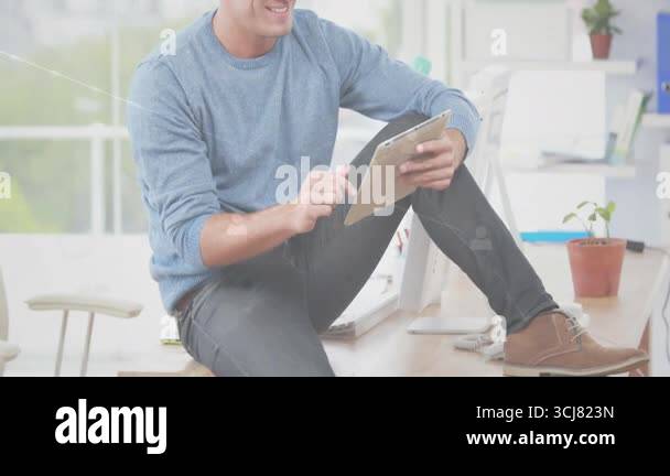Professional male tapping tablet and visualizing network icons overlay ...