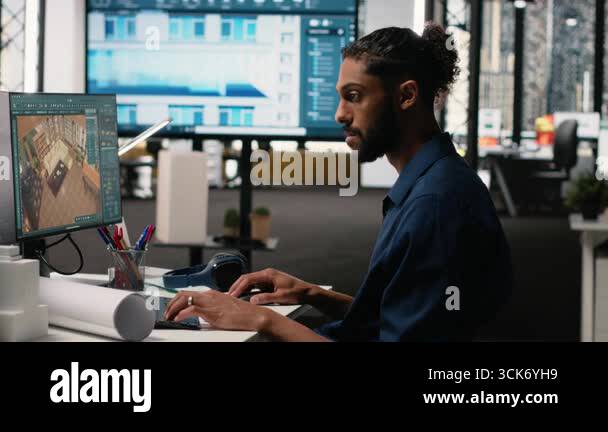 Middle eastern male developer creating property layout with furniture ...
