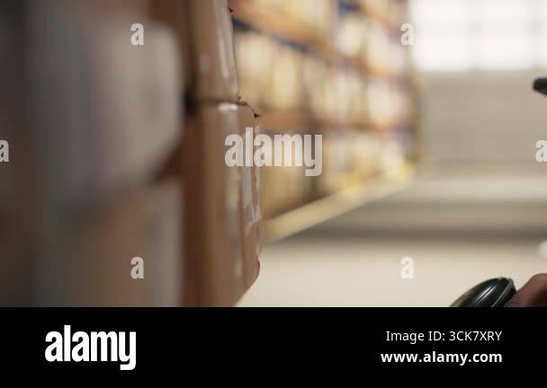 African american e-commerce employee scanning awb tracking numbers ...