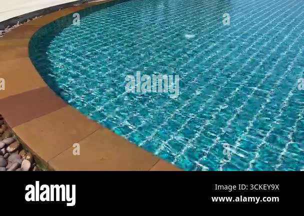 Swiming Vector Swimming pool at resort hotel Stock Video Footage - Alamy