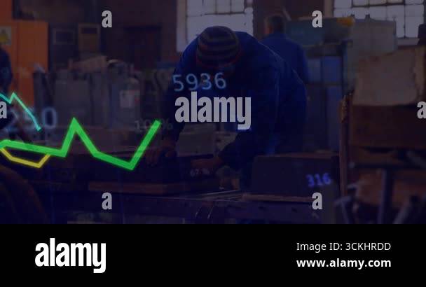 Senior craftsman guiding steel workpiece on bench when animated graphs ...