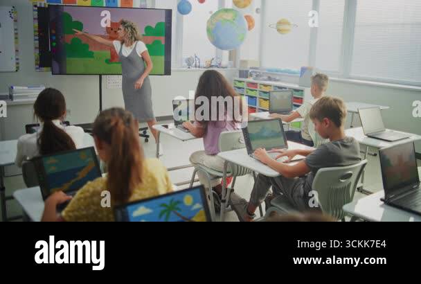 Teacher Educating Young Students, Showing Creative Learning on Digital ...