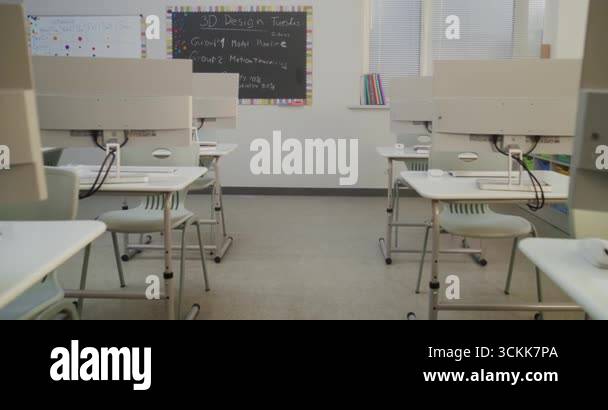 Modern Educational Space with Computer Desks, White Monitors. Computer ...