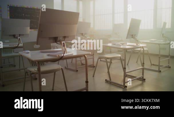 Modern Educational Space with Computer Desks, White Monitors. Computer ...